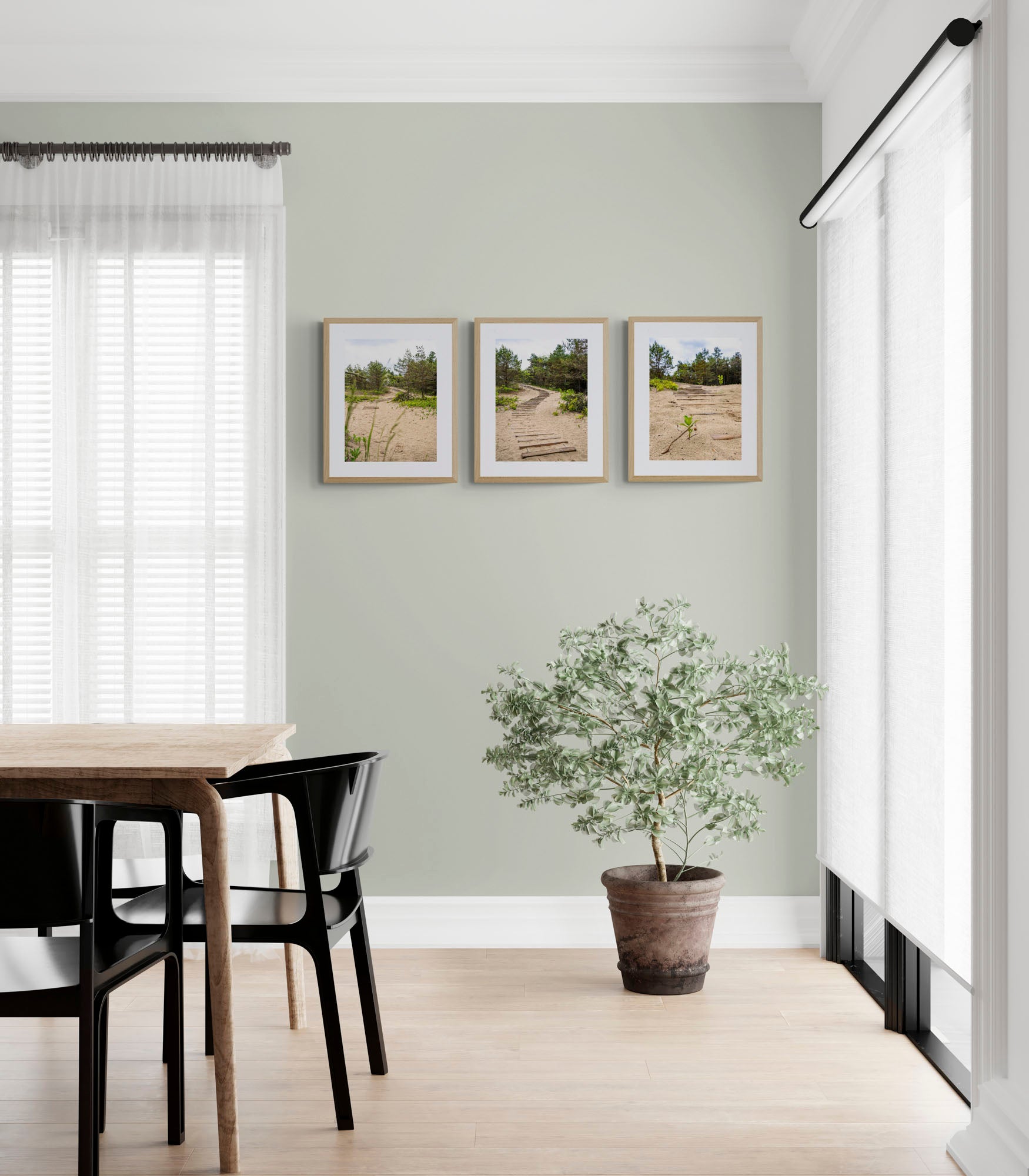 mockup of three hanged path photos above plant in dining room..